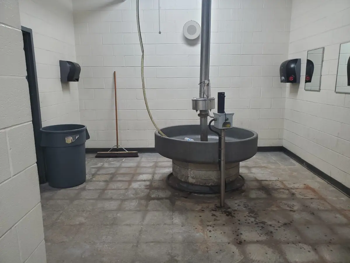 Commercial washroom before flooring renovation